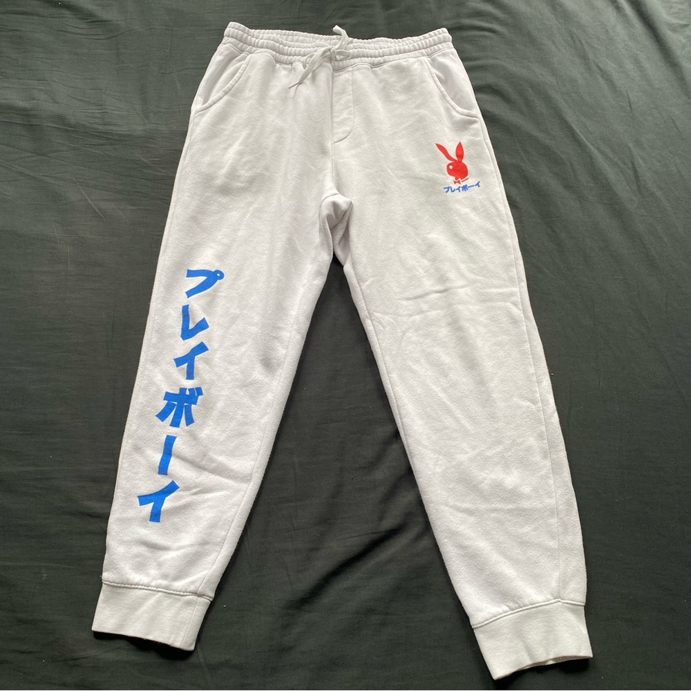 PLAYBOY White Joggers with Blue Japanese Script and Red Bunny Logo